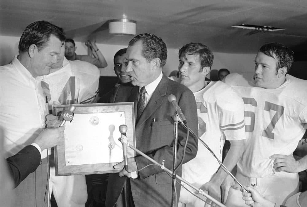 Richard Nixon awards Texas a national championship plaque.